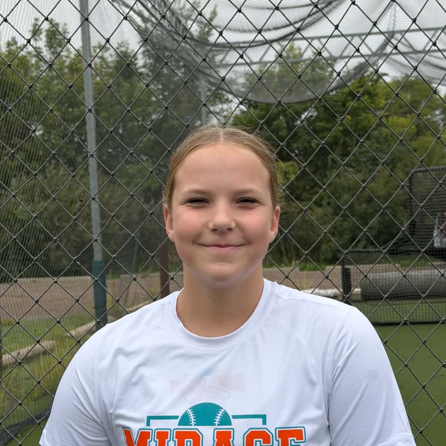 Peyton U. in a Mirage Softball shirt at the batting cages